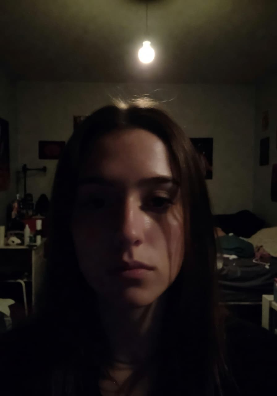 Bad selfie example for AI headshot generator — Dim or harsh light